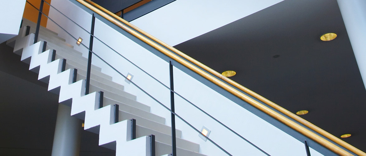 Sleek staircase within home interior.