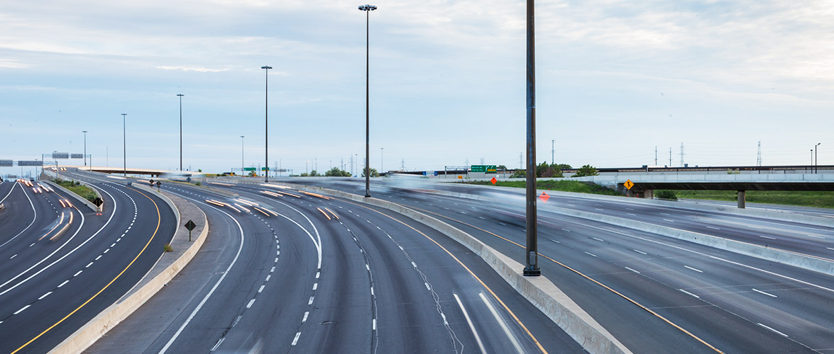 Multi-lane highway with several exits.